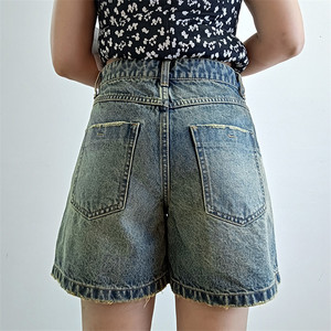 Chine Vente en gros de shorts en denim pour femmes confortables jeans courts déchirés décontractés de style rétro avec poche - Product Image 4