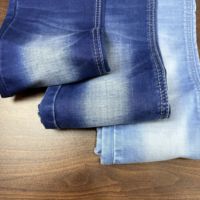 Tela vaquera de sarga pesada Lizhi LT-INDIGO, tejido elástico de poliéster, algodón y spandex para chaquetas vaqueras, jeans y bolsos de hombre y mujer