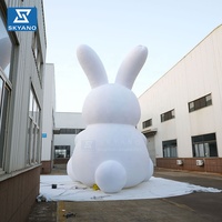 Mascotte gonflable géante personnalisée en forme de lapin de la lune pour la publicité et la décoration de parcs et lacs en extérieur