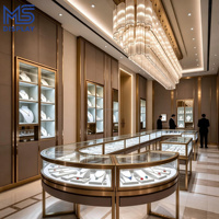 Vitrine de Luxe pour Bijouterie en Acier Inoxydable Doré avec Éclairage LED, Comptoir Îlot en Verre pour Colliers et Bagues, Personnalisable pour Boutiques de Détail