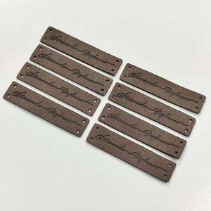 Xh-hot bán PU da logo nhãn tùy chỉnh dập nổi da vá Stickers với chất kết dính trở lại cho may mặc áo khoác và mũ - Product Image 1