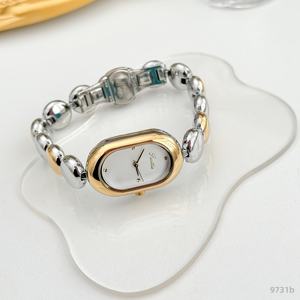Montre à quartz de luxe pour femme Scottie E9731b, design ovale simple, bracelet en acier inoxydable 9731b, élégance professionnelle et sportive - Product Image 3
