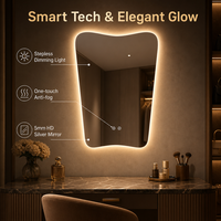 Miroir intelligent de salle de bain à LED rétroéclairé de forme irrégulière pour la décoration d'hôtel avec interrupteur tactile anti-buée
