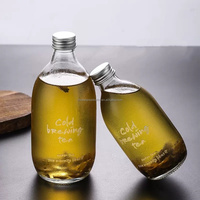 Bouteille ronde en verre de qualité alimentaire de 300ml 350ml 500ml pour jus eau café boisson liqueur thé lait bouteille en verre avec bouchon à vis
