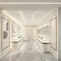 Vitrine de présentation de bijoux sur mesure, finition brillante, éclairage LED, vitrine en verre pour la vente au détail commerciale