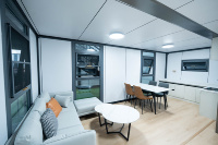 Maison conteneur extensible à double aile de 20 pieds, aspect bois, certifiée CE, pour l'hébergement des travailleurs