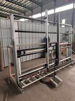 Banc de travail pneumatique pour l'assemblage et la réglage des portes et fenêtres pour les machines à verre