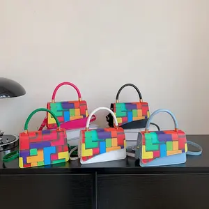 सबसे लोकप्रिय रंगीन लड़कियों प्यारा मिनी ढोना हैंडबैग महिलाओं के डिजाइनर दूत बैग चमड़े Crossbody फोन गोफन बैग हैंडबैग