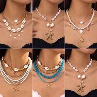 Collier multicouche en fausses perles et pierres pour femme, style bohème, avec pendentif étoile de mer et coquillage, chaîne de clavicule