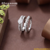 Blossom CS Jewelry Ensemble de deux bagues torsadées en argent sterling 925 plaqué platine avec zircon cubique taille brillant, alliance de mariage pour femme