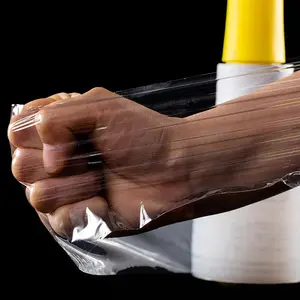 عينة مجانية LLDPE لفة حزمة اليد التفاف غشاء تغليف بلاستيكي يمكن تمديده مع مقبض صغير أسود تمتد فيلم