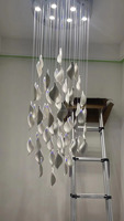 Lustres nordiques personnalisés de feuilles de verre de haute qualité pour les lustres en cristal d'escalier de salon de villa de luxe de hall d'hôtel