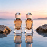 Botol Parfum Silinder Kaca Borosilikat Kosong 50ml dengan Cetakan Logo Transparan yang Populer dan Eksklusif