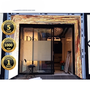 หน้าจอ LED แบบตาข่ายโปร่งใสสีเต็มรูปแบบ Muenled พร้อมมุมมองกว้าง 90 องศา มาตรฐาน IP66 สำหรับการโฆษณาภายนอกอาคาร - Product Image 5