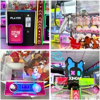 Machine à griffes métallique commerciale personnalisée à quatre joueurs, à monnayeur, avec garantie d'un an et support en anglais pour les centres de jeux