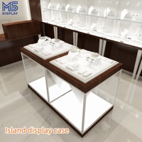 Vitrine de présentation de bijoux LED sur mesure au design créatif pour magasin de bijoux en centre commercial