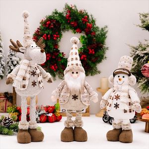 Acogedora Figura Navideña de Muñeco de Nieve a Cuadros Beige y Marrón con Piernas Extensibles para Decoración de Mesa Navideña y Regalo - Product Image 1