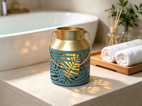 Lanterne en métal bleu sarcelle à découpes en forme de feuille, lanterne décorative portable en fer avec bordure dorée, option d'éclairage LED personnalisable
