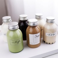 Bouteille de lait en plastique PET jetable de 250ml avec bouchon en aluminium pour jus de fruit soda bière et boissons énergisantes