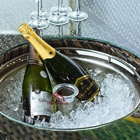 Meubles de luxe en rotin pour l'extérieur Table ronde et chaises avec seau à glace Patio Restaurant Hôtel Dîner Ensemble pour 6-8 places