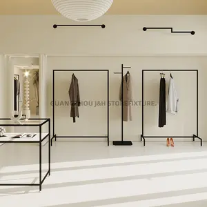 Basit klasik giysi rafı moda siyah paslanmaz çelik yatak odası giysi standı fabrika toptan yüksek kaliteli elbise ekran