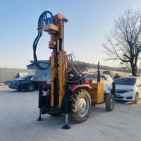 Tracteur d'occasion BDM, foreuse de puits d'eau DTH portable montée sur camion, moteur diesel, boîte de vitesses, roulement, pompe, profondeur max. 200m, 50 CV, capacité de levage 12T