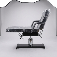 Table de massage hydraulique professionnelle réglable avec base robuste, idéale pour les cliniques de médecine esthétique et les salons de beauté