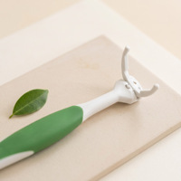 Porte-fil dentaire portable ergonomique en plastique rechargeable avec têtes de remplacement confortables à clipser