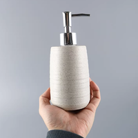 Distributeur de savon liquide pratique en résine, design moderne, rechargeable, pour salle de bain d'hôtel