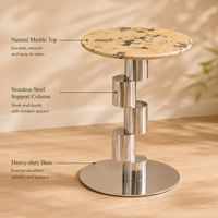 Table basse ronde moderne en marbre écologique de luxe avec base en colonne métallique pour salon et hôtel