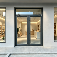 Porte de magasin commerciale en aluminium gris anthracite à cadre fin, double battant en verre avec ferme-porte pour magasin