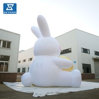 Mascotte gonflable géante personnalisée en forme de lapin de la lune pour la publicité et la décoration de parcs et lacs en extérieur