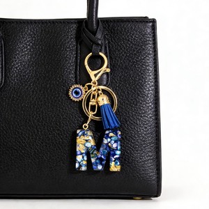 Superventas transfronterizo: Llavero de <span class=keywords><strong>moda</strong></span> azul zafiro con letra inglesa, colgante de borla Ojo del Diablo para decoración de bolso, regalo de joyería - Product Image 3