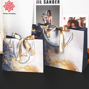 Sacs en papier de luxe Baoren pour cadeaux et emballages, sacs en papier en gros avec votre propre logo pour les vêtements et les petites entreprises - Product Image 1