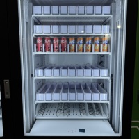 Distributeur automatique intelligent réfrigéré pour snacks et boissons avec système d'ascenseur, compatible SDK et intégration cloud pour l'Europe