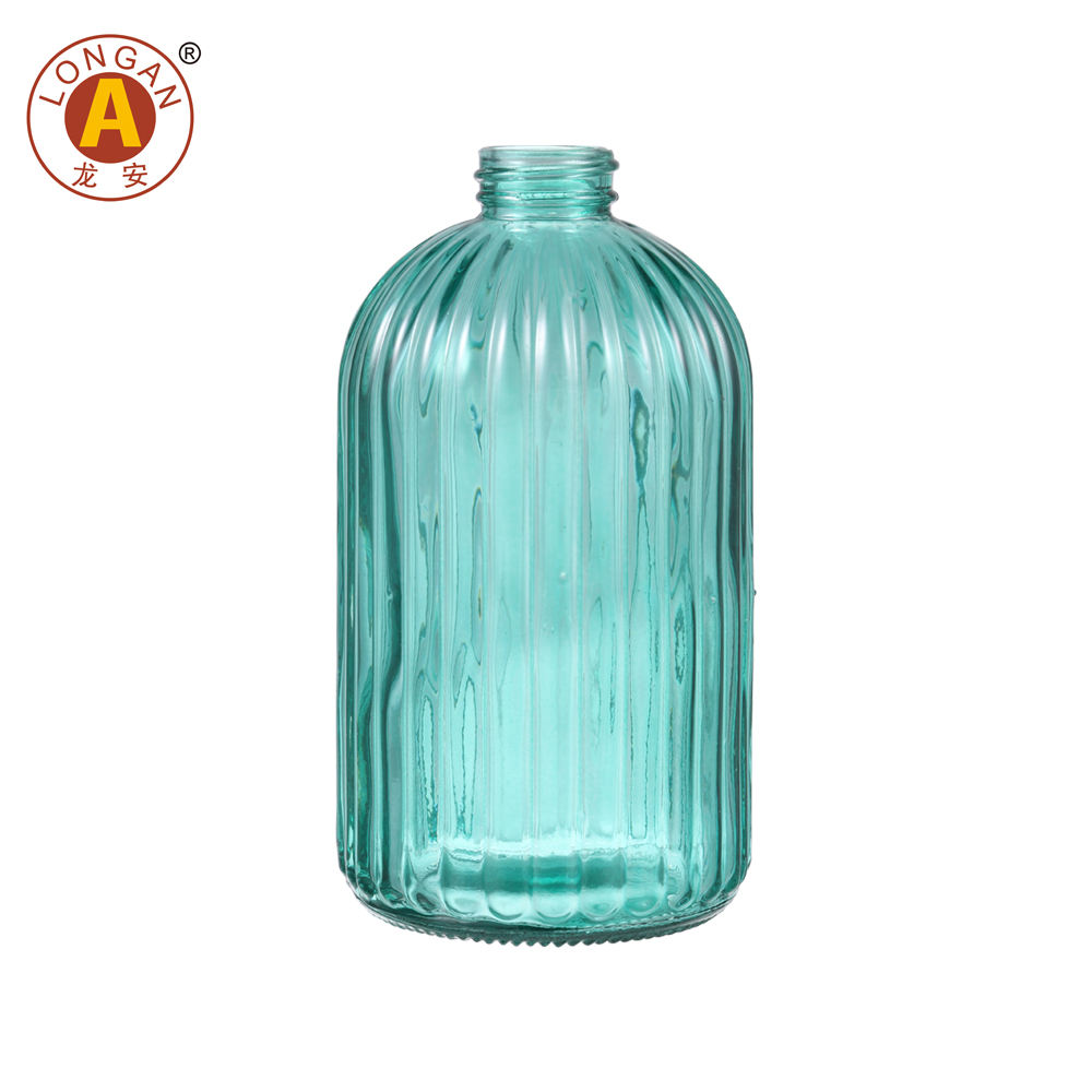 Bouteille en verre vert sans pompe à lotion