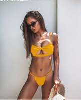 Venta al por mayor personalizado estilo caliente señoras dividir traje de baño niñas micro gran tamaño blanco cadena bikini traje de baño