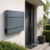 Boîte aux lettres autoportante noire moderne avec design géométrique, résistante aux intempéries, en acier galvanisé
