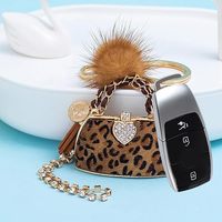 Nouveau porte-clés tendance en fourrure de vison, pendentif personnalisé imprimé léopard pour sac à main et raffiné pendentif de sac