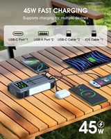 Démarreur solaire portable, batterie solaire portable pour l'extérieur avec 4 câbles de charge, thermomètre, boussole, lampe de camping, lampe torche