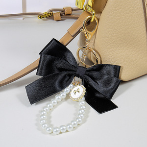 INS nouveau Style inspiré <span class=keywords><strong>perle</strong></span> arc porte-clés sac <span class=keywords><strong>pendentif</strong></span> accessoires dragonne téléphone lanière téléphone en gros - Product Image 6