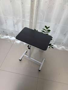 シンプルな昇降式は、回転式テーブルトップと車輪を備えたラップトップデスクよりも移動が容易です - Product Image 2