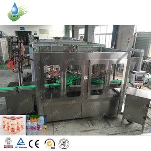 Machine <span class=keywords><strong>de</strong></span> remplissage <span class=keywords><strong>de</strong></span> bouteilles <span class=keywords><strong>de</strong></span> jus <span class=keywords><strong>de</strong></span> lait en HDPE <span class=keywords><strong>Litchi</strong></span> et machine <span class=keywords><strong>de</strong></span> scellage <span class=keywords><strong>de</strong></span> papier d'aluminium - Product Image 3