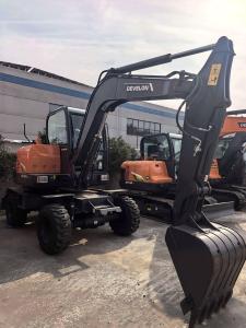 Excavatrice sur roues compacte Develon DX60W ECO hautement mobile pour projets urbains - Product Image 5