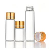 Vente en gros de flacons en verre mini écologiques avec bouchon en aluminium à vis, impression sérigraphique, différentes capacités (5 ml-30 ml), flacon pour la distribution de poudre