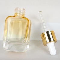 Bouteille d'huile rectangulaire de 30ml emballage de sérum en verre pour les soins de la peau Bouteille de sérum capillaire avec pompe Bouteille d'huile essentielle pour cosmétique