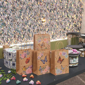 New Eco-Friendly Kraft Paper Flower-and-Bird <b>Gift</b> <b>Bags</b> with Cotton Rope Handle for Clothing Souvenirs and Crafts - Product Image 3