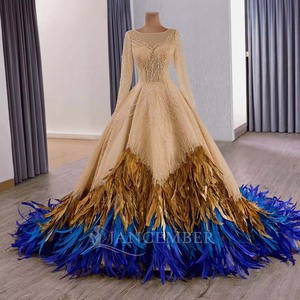 ชุดราตรีทรงบอลกาวน์แขนยาวสีทองหรูหรา รุ่น 251007 สำหรับชาวมุสลิม ยาวกรอมพื้น แต่งระบายจีบแบบธรรมชาติ - Product Image 1