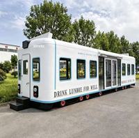 Restaurant mobile sur rail personnalisé avec cuisine complète, camion de restauration rapide équipé d'un café, très prisé des restaurants