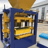 Machine à fabriquer des blocs solides hydrauliques QT4-24 pour matériaux de construction